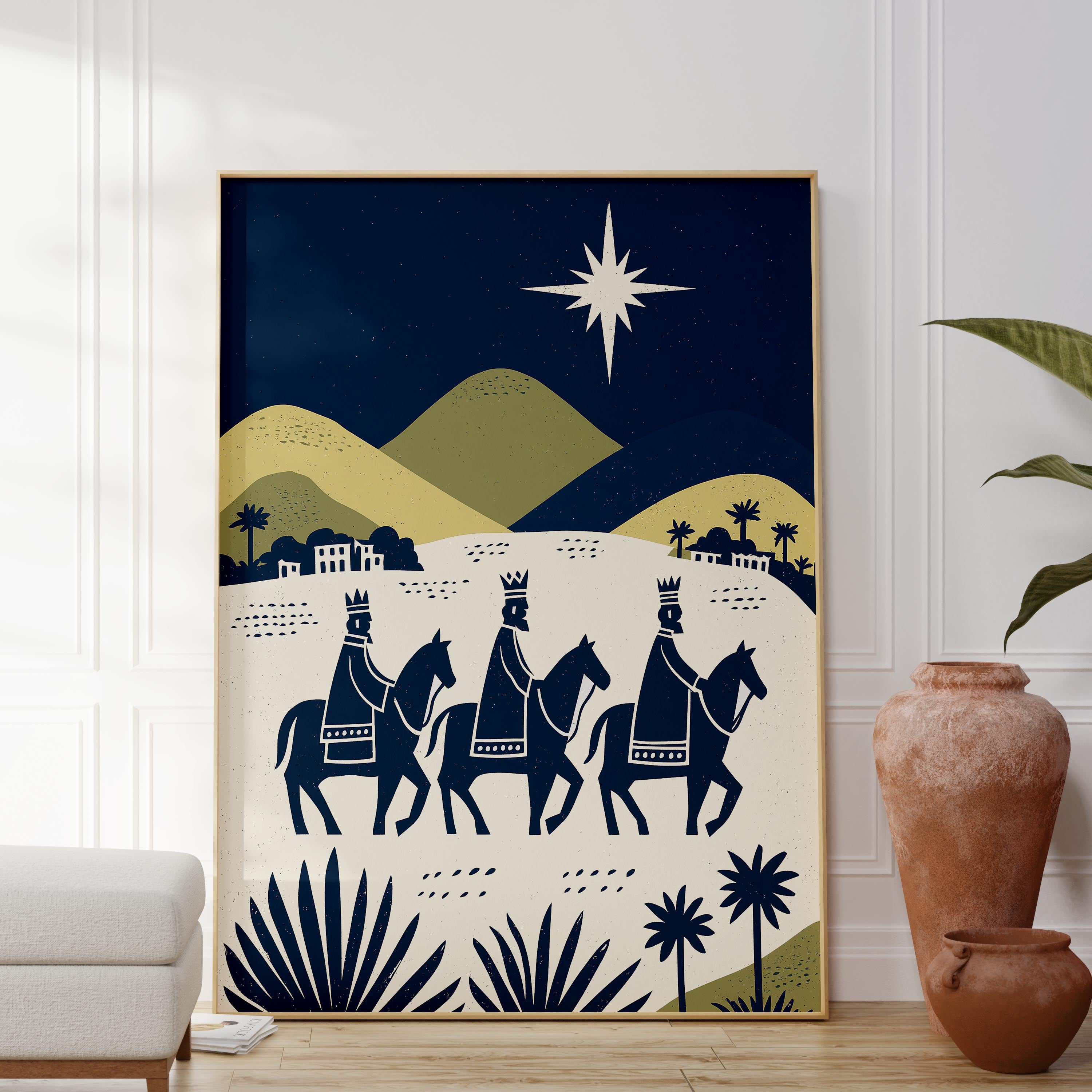 A framed illustration depicting three wise men on horseback, with a star in the sky and a desert landscape in the background.