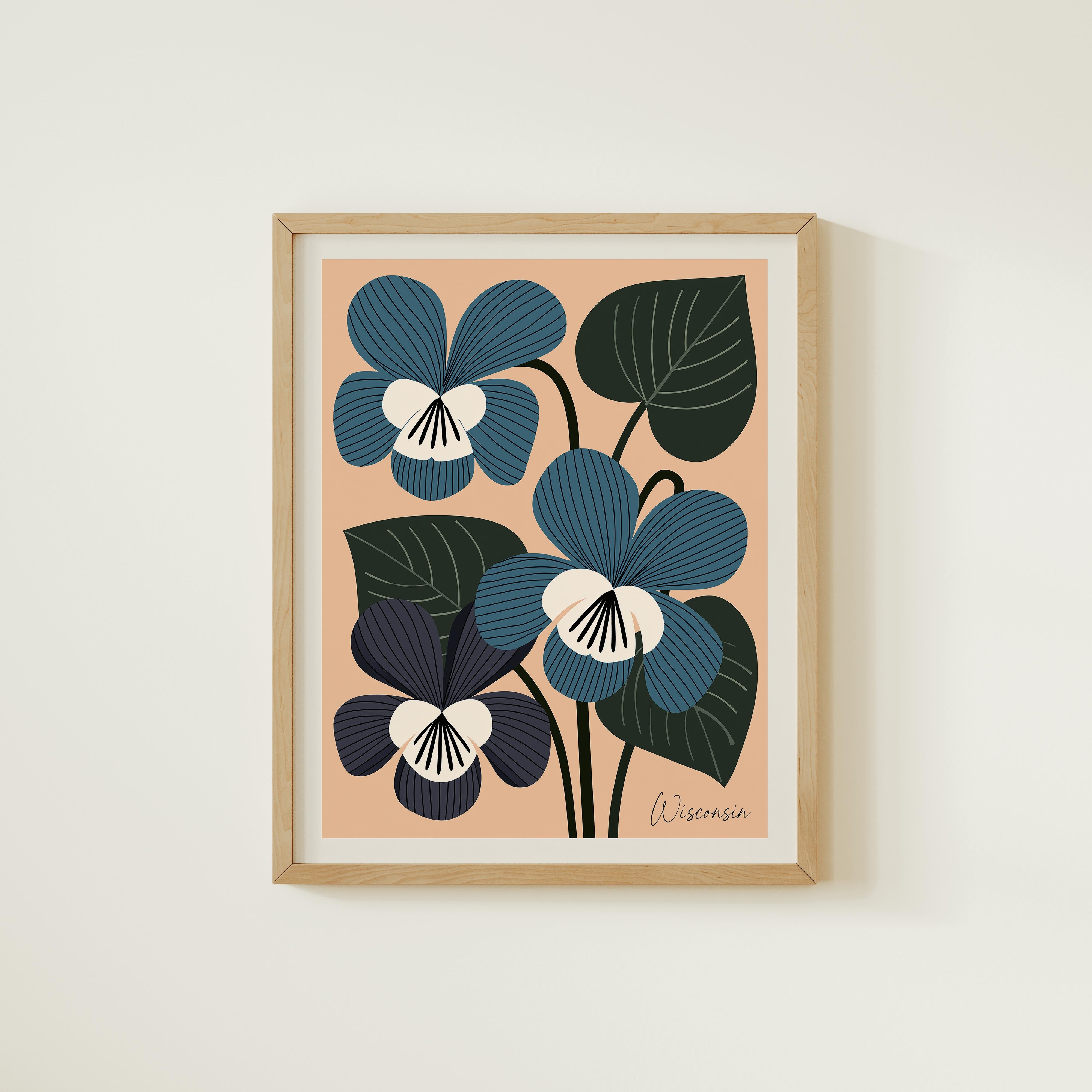 The image is a framed print featuring a stylized illustration of blue and green flowers with leaves.