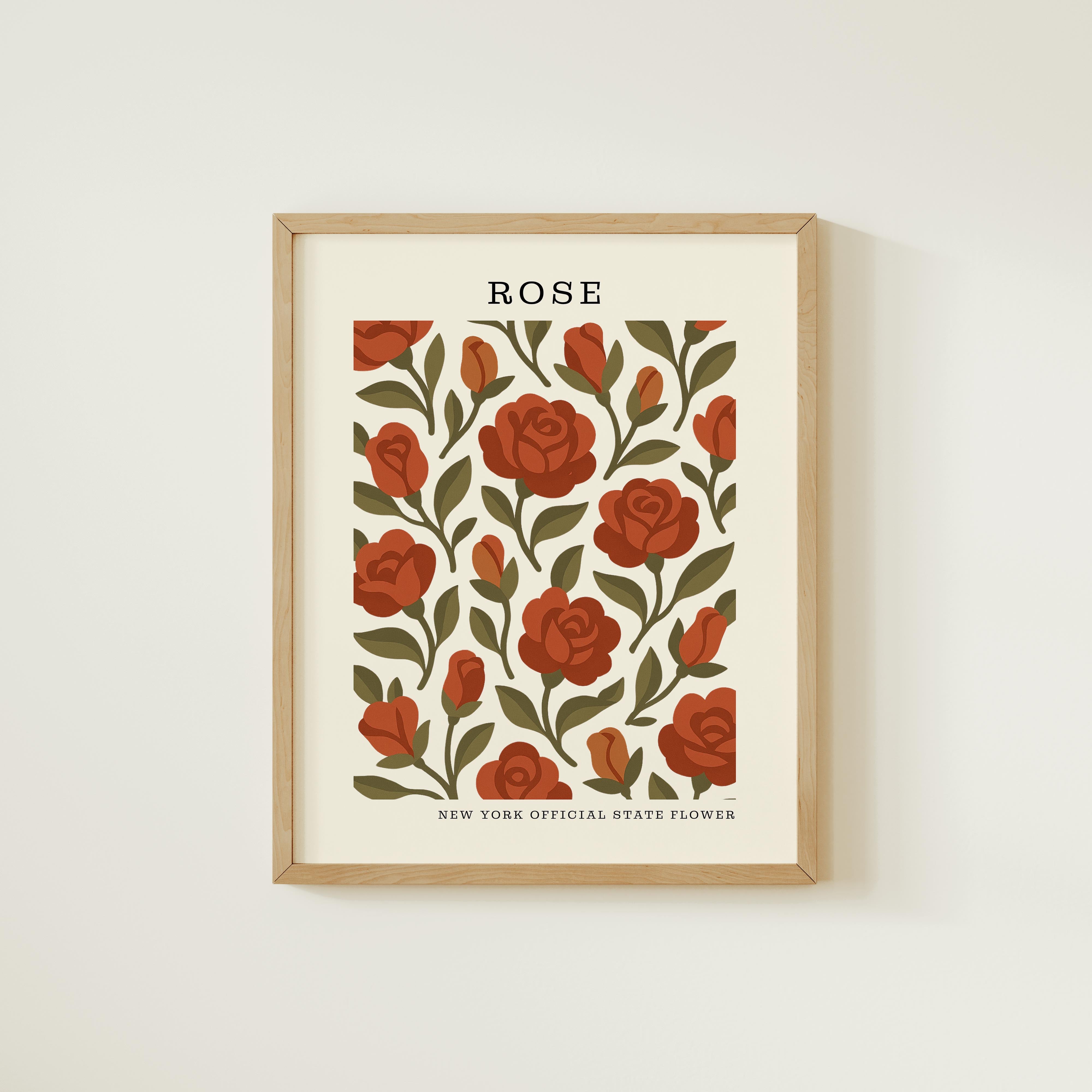 The image is a framed print featuring a repeating pattern of red roses and green leaves.