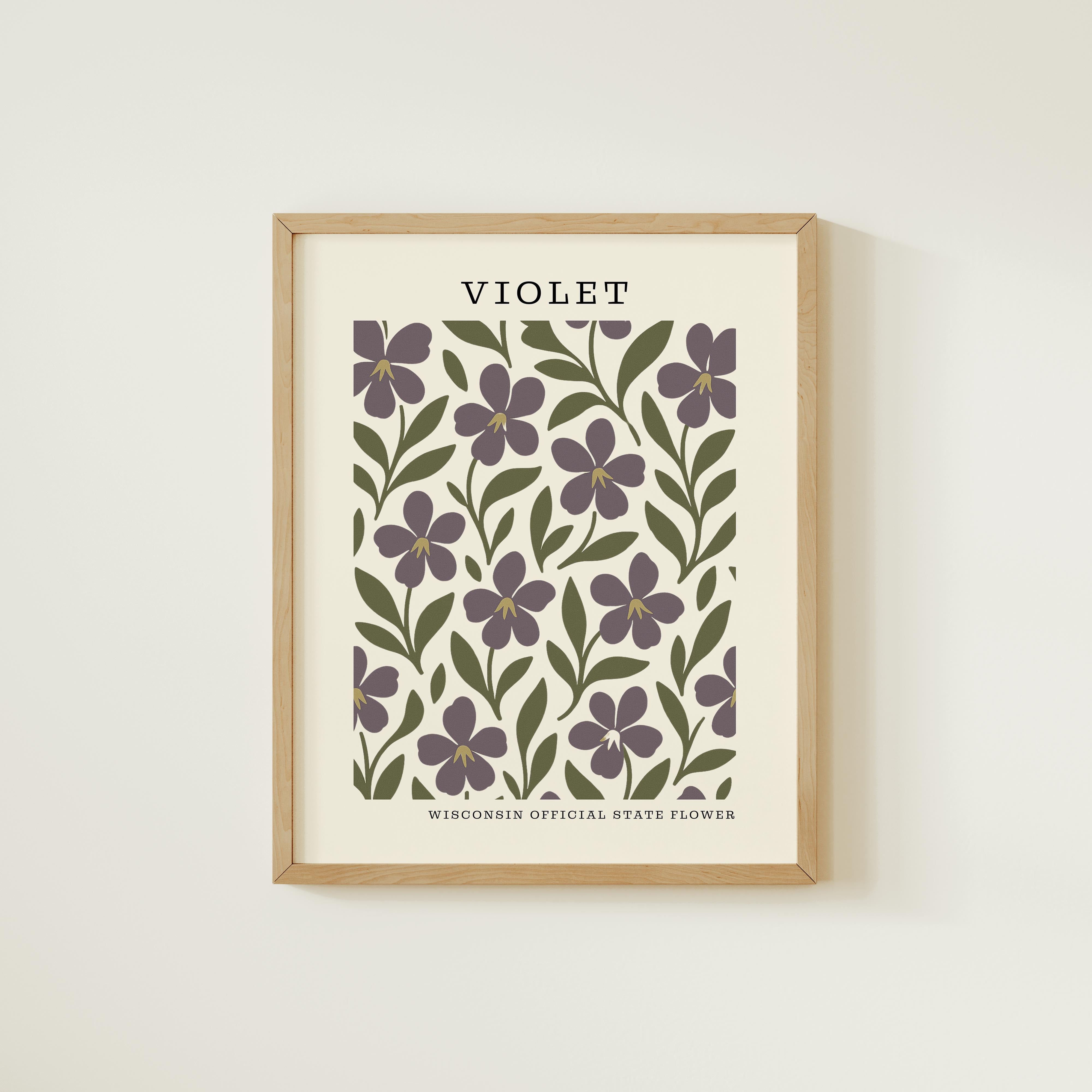 The image is a framed print featuring a repeating pattern of purple flowers with green leaves.