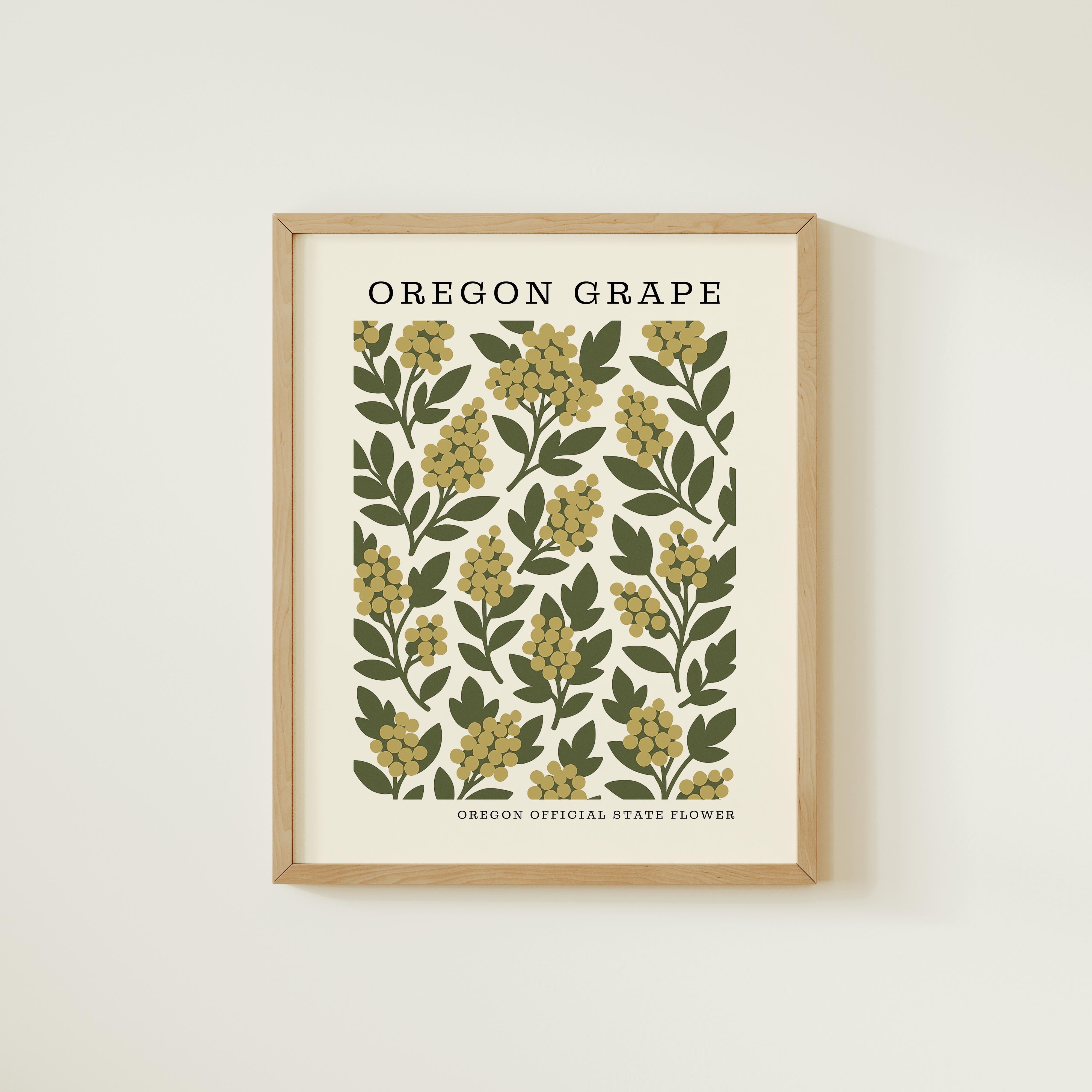 The image is a framed print featuring a repeating pattern of green leaves and yellow flowers, with the text "OREGON GRAPE" and "OREGON OFFICIAL STATE FLOWER" printed on it.