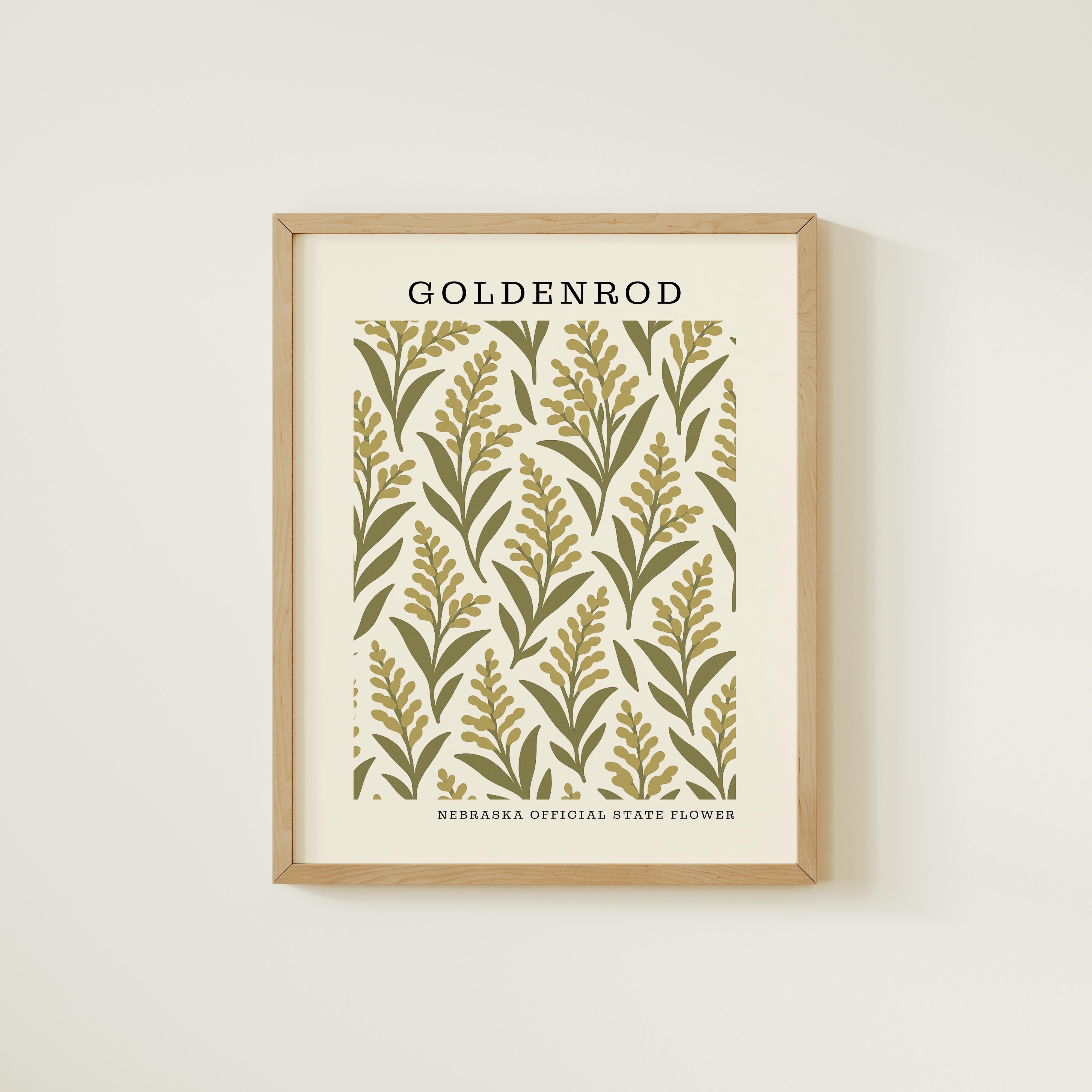 The image is a framed print featuring a repeating pattern of green leaves and yellow flowers, with the text "GOLDENROD" and "NEDRASKA OFFICIAL STATE FLOWER" printed on it.