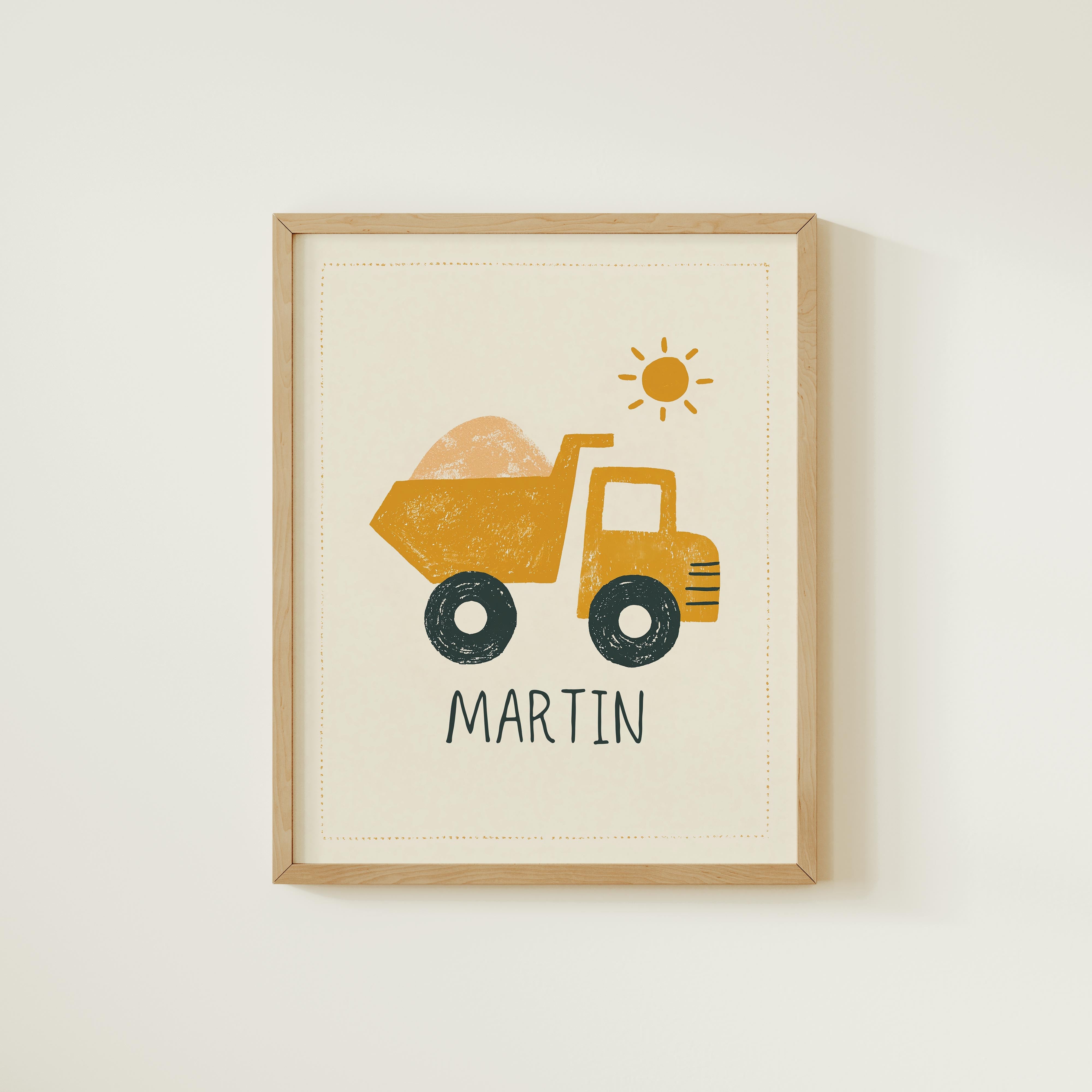 The image is a framed print featuring a yellow dump truck with a sun above it, and the name "MARTIN" written below the truck.