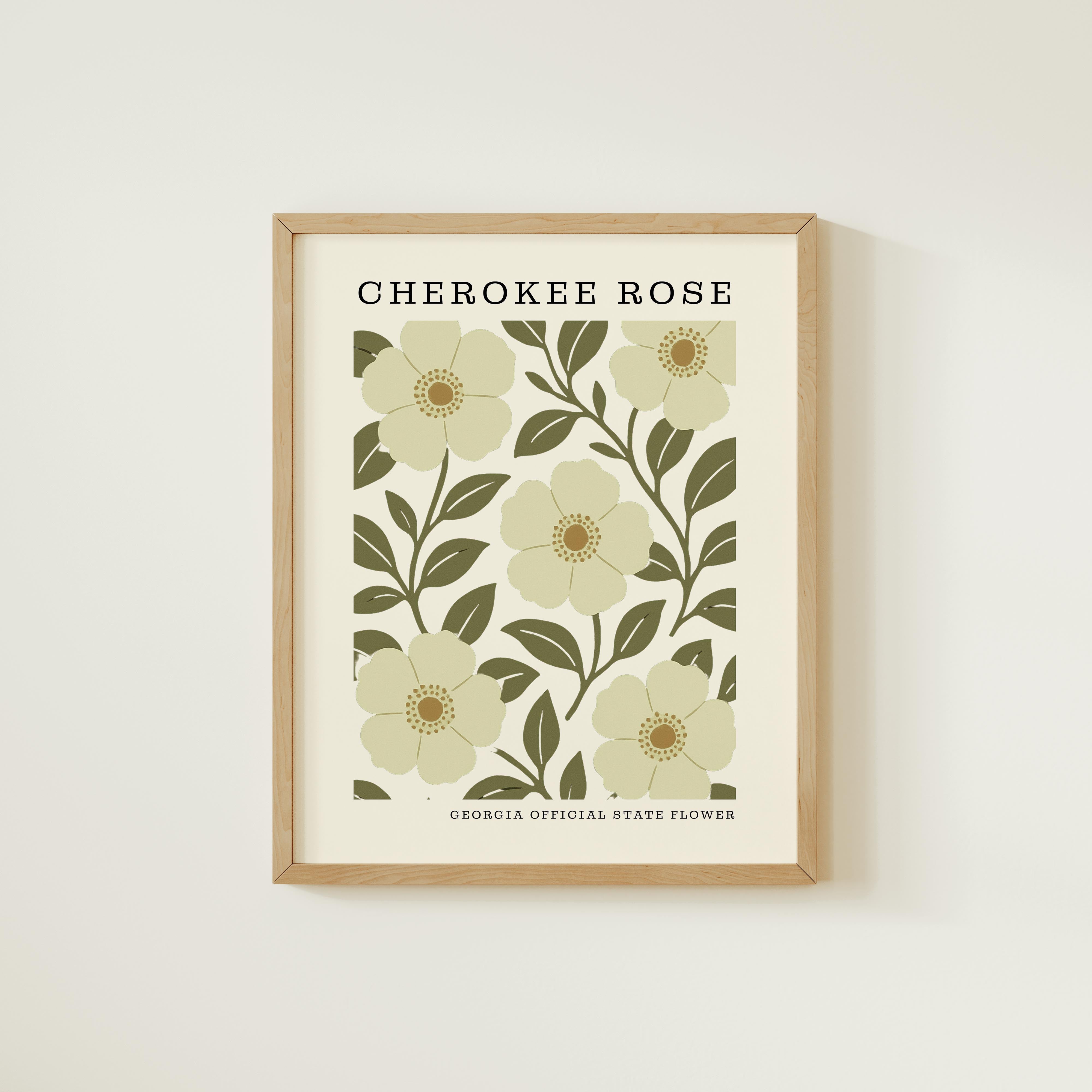 The image is a framed print featuring a repeating pattern of white flowers with green leaves, with the text "CHEROKEE ROSE" and "GEORGIA OFFICIAL STATE FLOWER" printed on it.