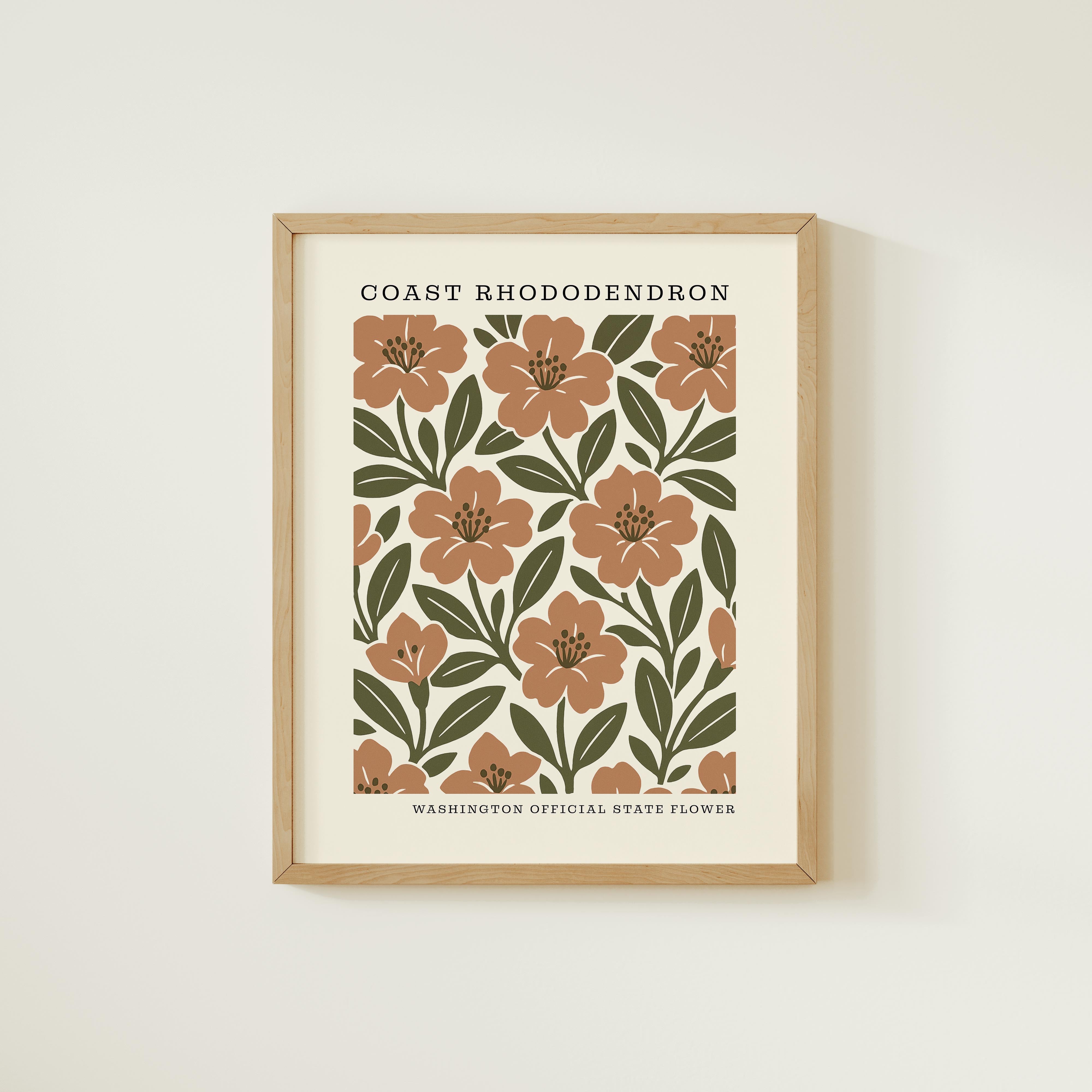 The image is a framed print featuring a repeating pattern of orange flowers with green leaves, set against a white background.