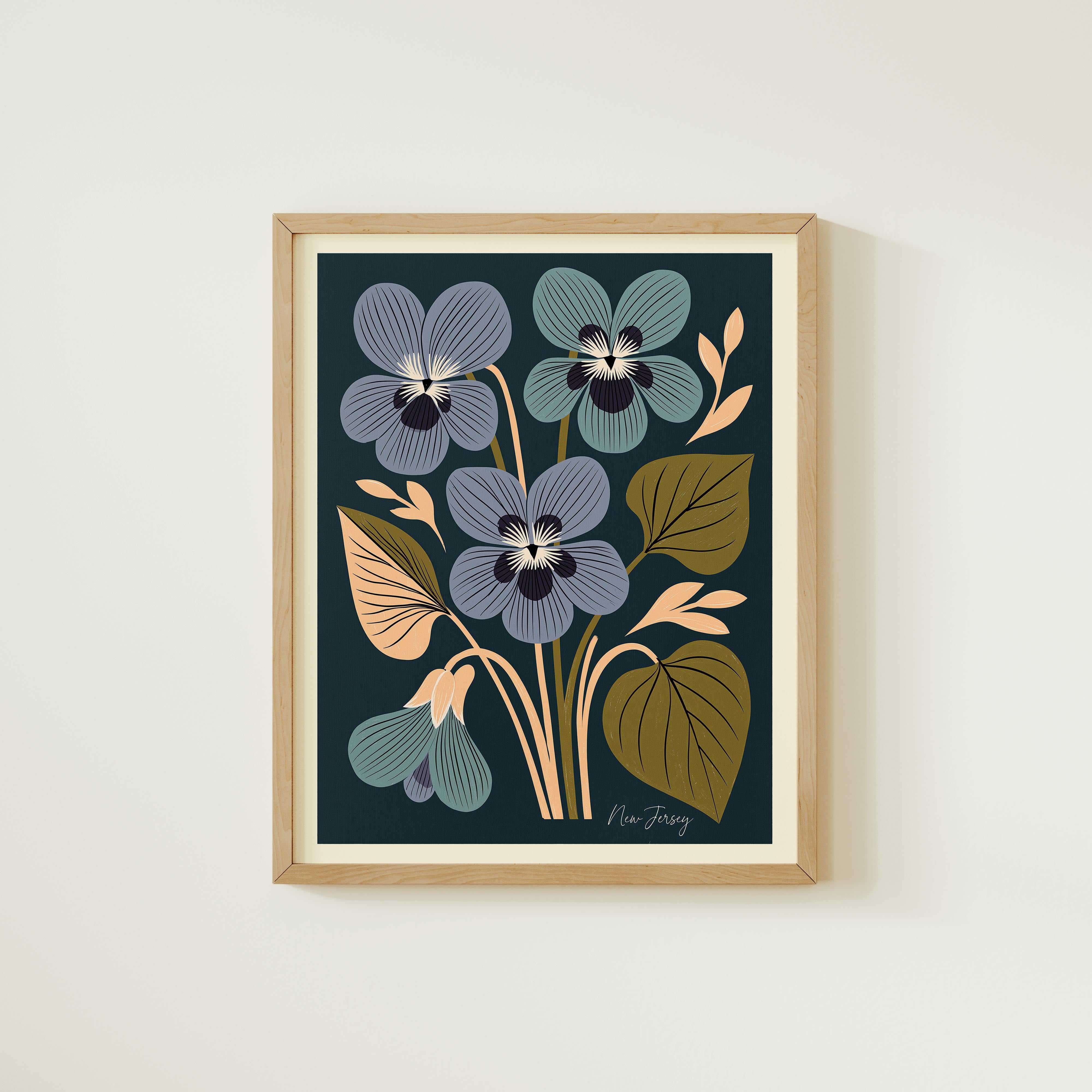 The image is a framed print featuring a stylized floral design with blue, green, and orange flowers and leaves.