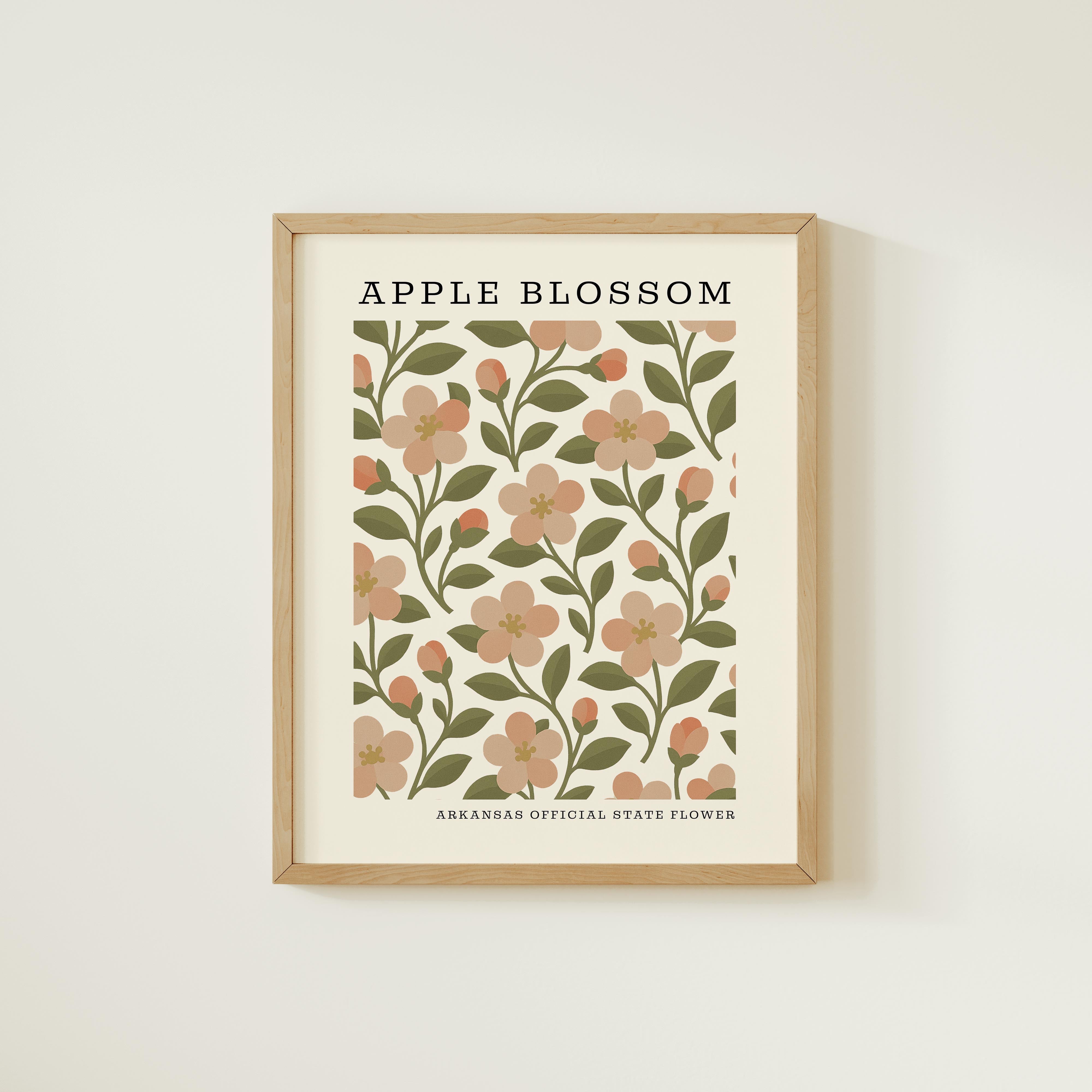 The image is a framed poster or artwork featuring a repeating pattern of pink flowers with green leaves, which appears to be an illustration of an apple blossom.